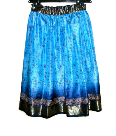 Knee length silk skirt with lining.